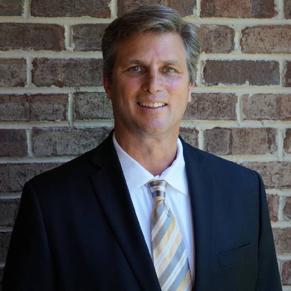 Experienced land professional showcasing land investment and consulting services at Land Guy.Online.